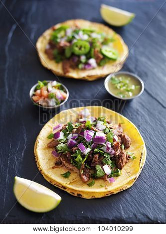 two authentic mexican street tacos with barbacoa beef