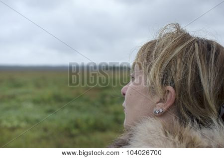 Woman Looking To Horizon