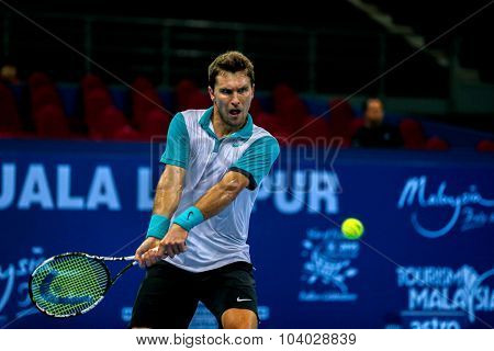 KUALA LUMPUR, MALAYSIA - SEPTEMBER 27, 2015: Mischa Zverev of Germany plays in his qualifying match at the Malaysian Open 2015 Tennis tournament held at the Putra Stadium, Malaysia.