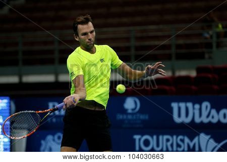 KUALA LUMPUR, MALAYSIA - SEPTEMBER 30, 2015: Ivo Karlovic of Croatia hits a forehand return in his match at the Malaysian Open 2015 Tennis tournament held at the Putra Stadium, Malaysia.