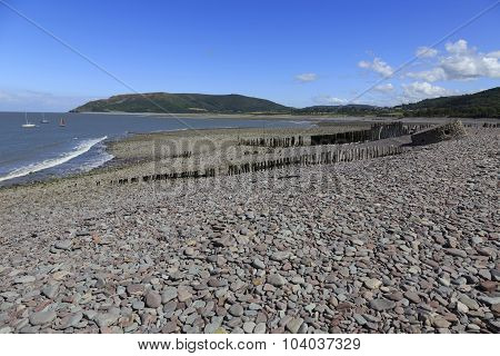 Old Worn Breakers On A Beach