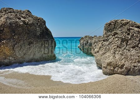 Rocks in the blue waters of Megali Petra Beach, Lefkada
