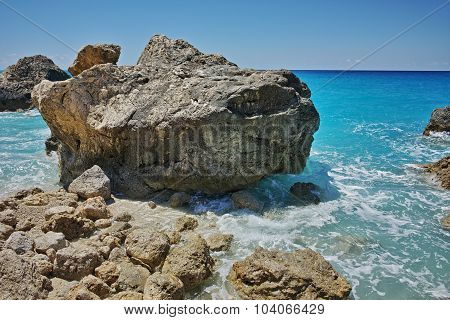 Big Rock in the blue waters of Megali Petra Beach, Lefkada