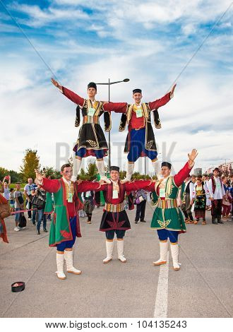 NOVI SAD, SERBIA-OCT 4, 2015: Guinness World Record Largest Folk Dance on Oct 4. 2015 in Novi Sad, Serbia. Over 12.000 participants break the Guinness World Record by simultaneously dancing a Kolo