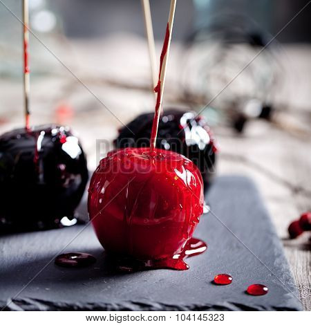 Halloween black and red caramelized apples