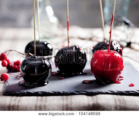 Halloween black and red caramelized apples