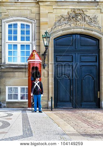 COPENHAGEN, DENMARK - JULY 07: Danish soldier guarding Amalienborg Palace on July 07, 2015. Amalienb