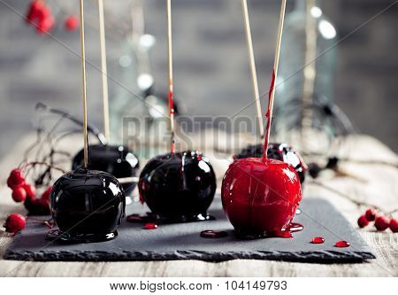 Halloween black and red caramelized apples