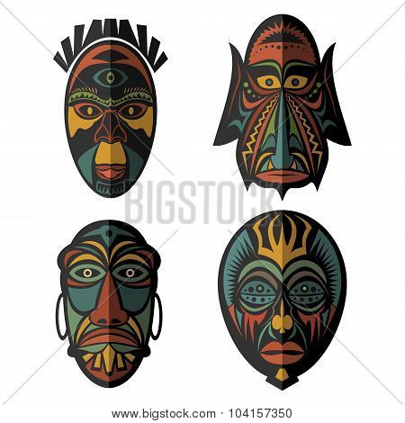 Set of African Ethnic Tribal masks on black background.
