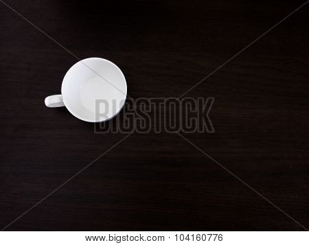 white coffee cup on the table