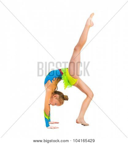tittle gymnast doing stretching exercise isolated on white background