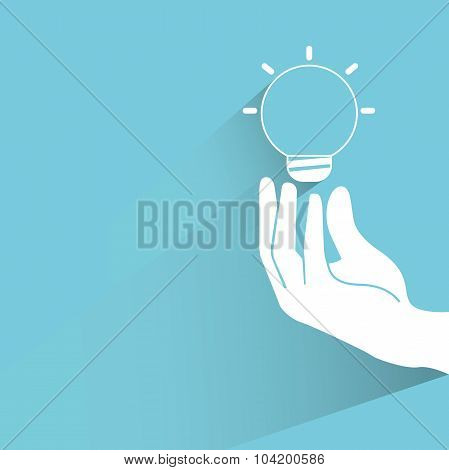 hand holding light bulb