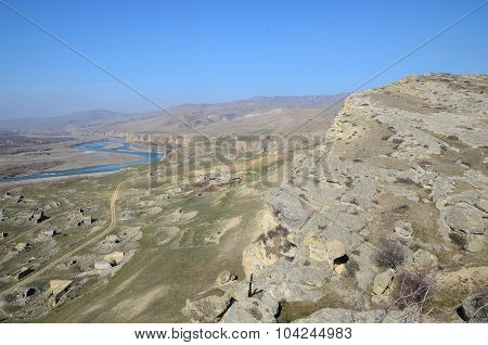Top view on the ruins of old city Uplistsikhe near Aragvi river valley. Caucasus region, Georgia.