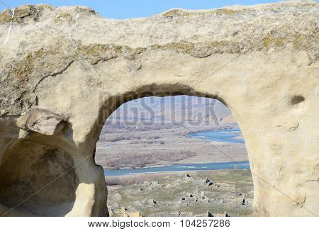 Top View On Old Cave City Uplistsikhe Through The Archway, Georgia