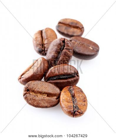 Brown coffee beans isolated on white