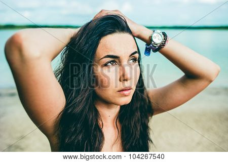 Long Hair Girl Relaxing On The Beach