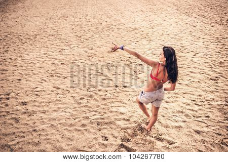 Long Hair Girl Relaxing On The Beach
