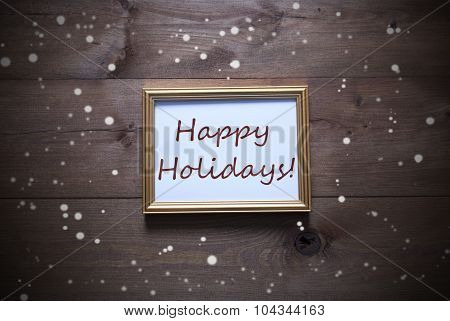 Golden Picture Frame With Happy Holidays And Snowflakes