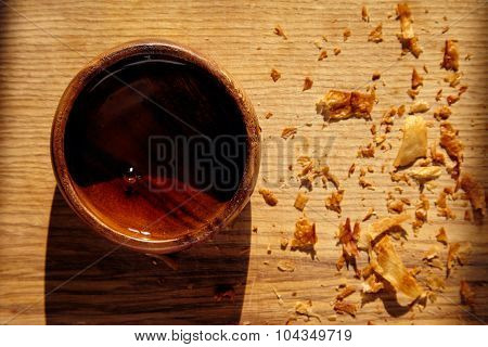 Wooden Bowl With Honey On Wood With Croissant Crumbles