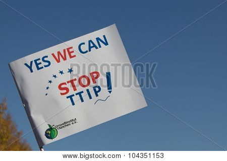 Stop ttip slogan on white flag, demonstration, berlin