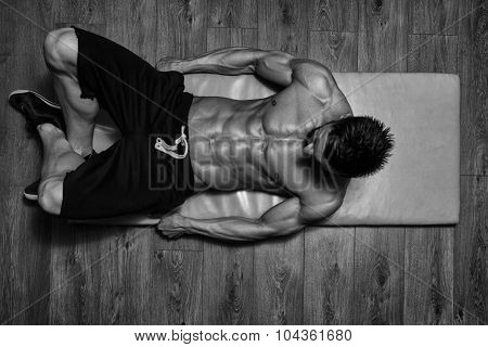 Healthy Man Doing Sit-ups On Foor