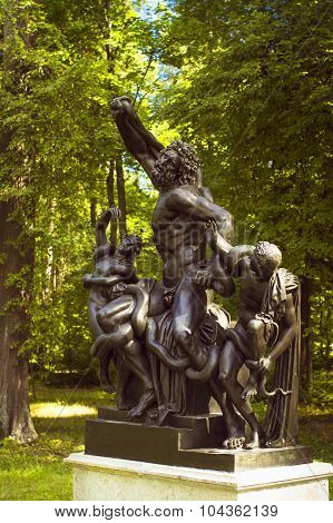 Bronze sculpture nude men with a snake in Oranienbaum