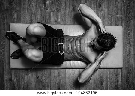 Healthy Man Doing Abdominal Excerise On Foor