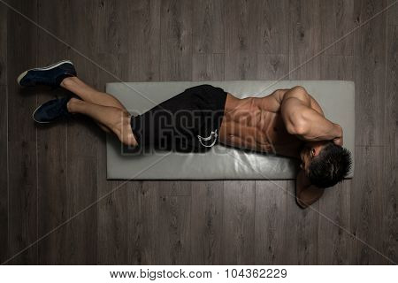 Healthy Man Doing Sit-ups On Foor
