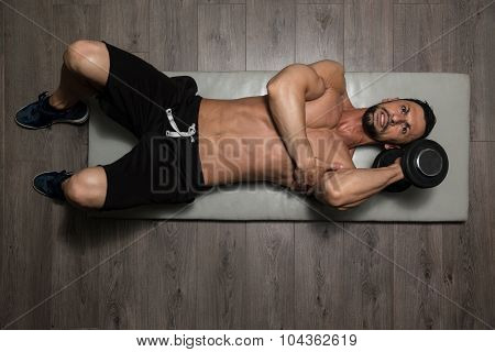 Healthy Man Exercising Triceps On Foor