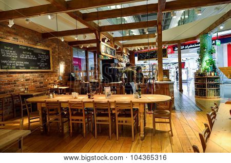 DUBAI, UAE - SEPTEMBER 08, 2015: restaurant in Dubai Airport. There are a lot of restaurants, bars, cafes and shops in Dubai International Airport. Almost all of them are open twenty-four hours.