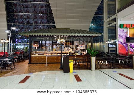 DUBAI, UAE - SEPTEMBER 08, 2015: Paul cafe in Dubai Airport. There are a lot of restaurants, bars, cafes and shops in Dubai International Airport. Almost all of them are open twenty-four hours.