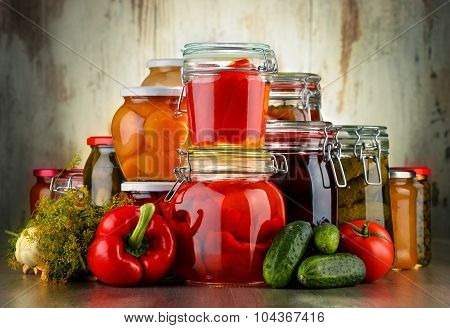 Jars With Pickled Vegetables And Fruity Compotes