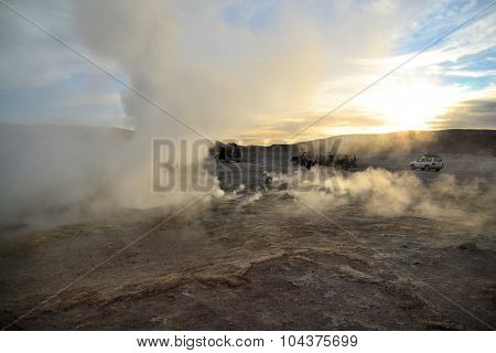 Tourists at a geysir in Southwestern Bolivia near Uyuni