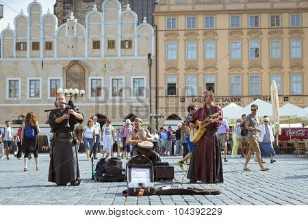 Musicians with folk instruments on old Town Square Prague