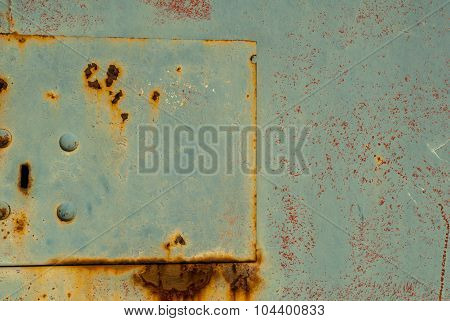 surface of rusty iron with remnants of old paint background