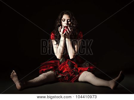 Strange Scary Girl With Mouth Sewn Shut Tries To Eat An Apple Studded With Nails