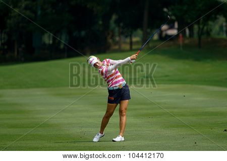 KUALA LUMPUR, MALAYSIA - OCTOBER 09, 2015: South Korea's Chella Choi plays her shot from the sixth hole fairway of the KL Golf & Country Club at the 2015 Sime Darby LPGA Malaysia golf tournament.