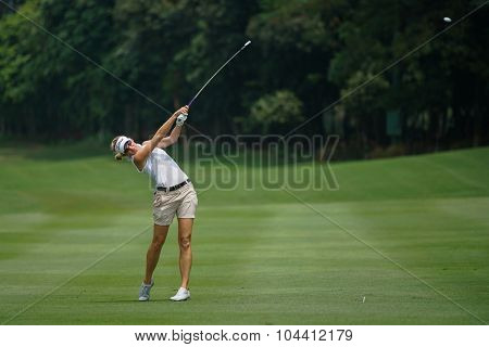 KUALA LUMPUR, MALAYSIA - OCTOBER 09, 2015: USA's Kris Tamulis plays her shot on the sixth hole fairway of the KL Golf & Country Club at the 2015 Sime Darby LPGA Malaysia golf tournament.
