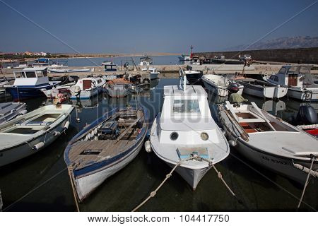 VINJERAC, CROATIA - AUGUST 19: Old boats in harbor at Adriatic sea. Vinjerac, Croatia, popular touristic destination, Croatia on August 19, 2014