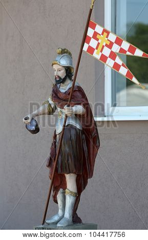 PETINA, CROATIA - JUNE 10: The statue of St. Florian patron of firefighters in front of the fire department Kosnica in Petina, Croatia on June 10, 2015.
