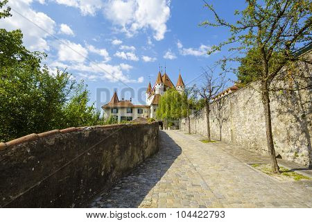 A Cobbled Road Leads To The Castle Thun