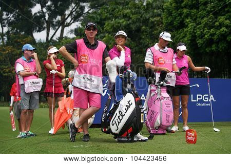 KUALA LUMPUR, MALAYSIA - OCTOBER 10, 2015: LPGA golfers wait to tee off at the sixth hole of the KL Golf & Country Club at the 2015 Sime Darby LPGA Malaysia golf tournament.