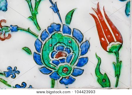 Tulips on the vintage tiles in Turkey