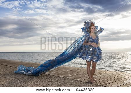 Models Walk An During  Outdoor Fashion Show With Clothing Made Out Of Recycled Materials Was Held In