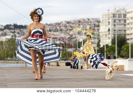 Models Walk An During  Outdoor Fashion Show With Clothing Made Out Of Recycled Materials Was Held In
