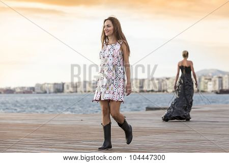 Models Walk An During  Outdoor Fashion Show With Clothing Made Out Of Recycled Materials Was Held In