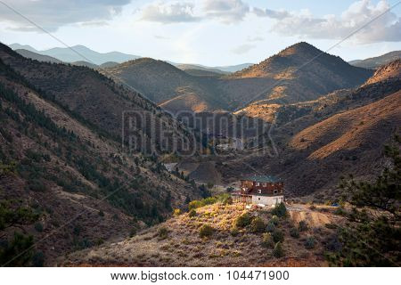Solitary Home On Top Of A Mountain