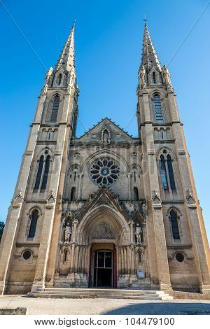 Fascade Of Cathedral Saint Baudile In The Nimes
