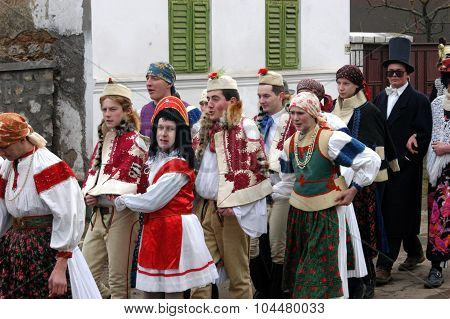 People In Traditional Costumes Celebrating The Winter Carnival