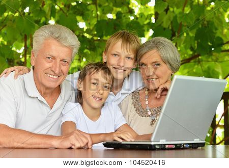 Family with laptop